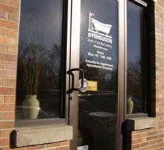 exterior storefront entrance 1121 River St Lansing, MI